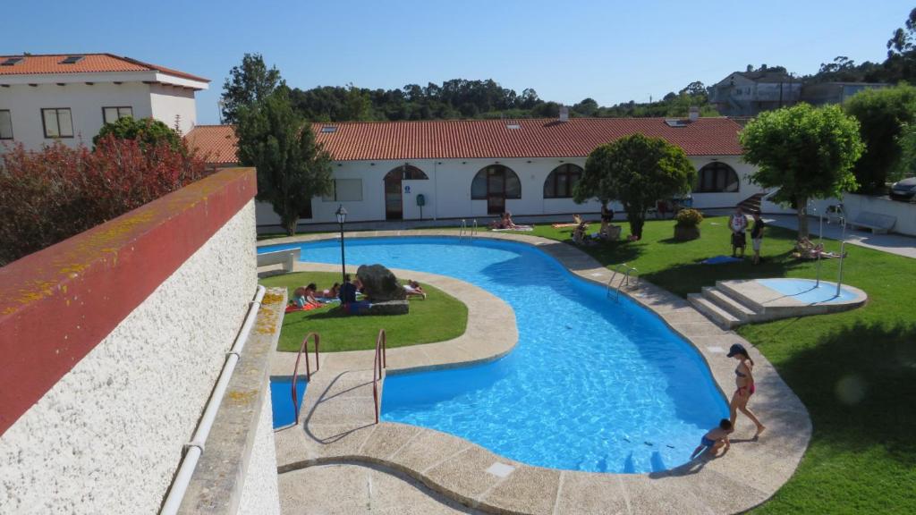 Bazén v ubytovaní Estudio con piscina en A Guarda- Pontevedra alebo v jeho blízkosti