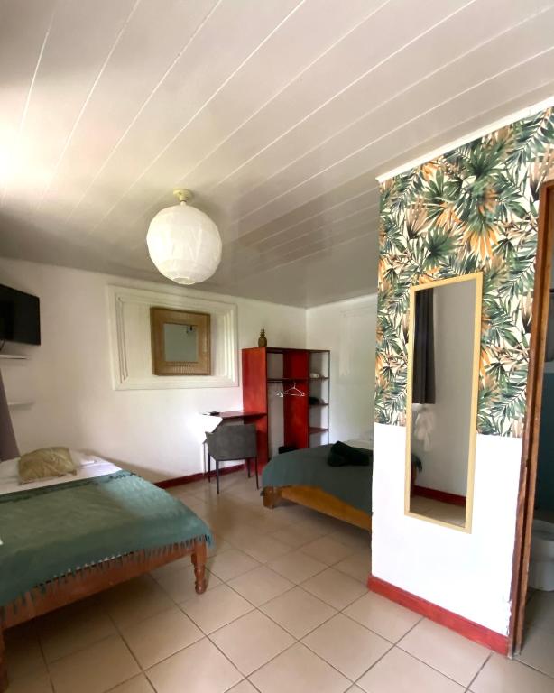 Postel nebo postele na pokoji v ubytování Cabinas Cahuita