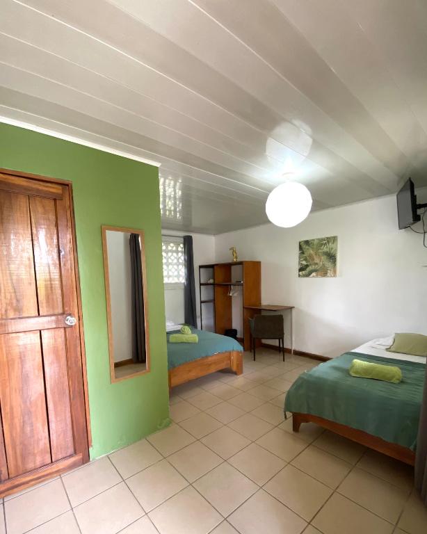 Postel nebo postele na pokoji v ubytování Cabinas Cahuita