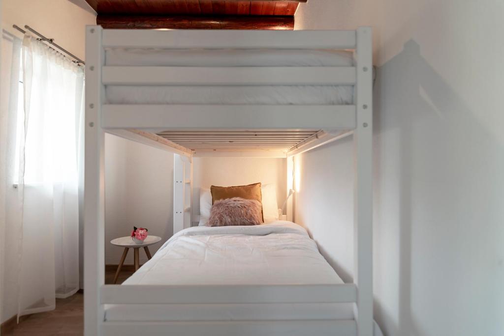 Postel nebo postele na pokoji v ubytování Massaresc apartment