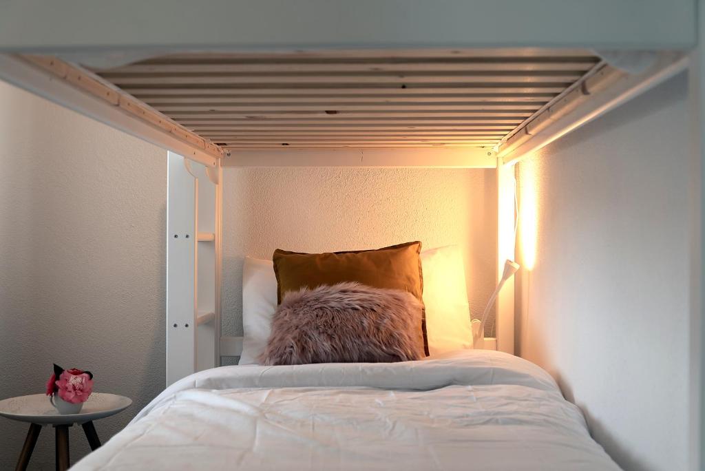 Postel nebo postele na pokoji v ubytování Massaresc apartment