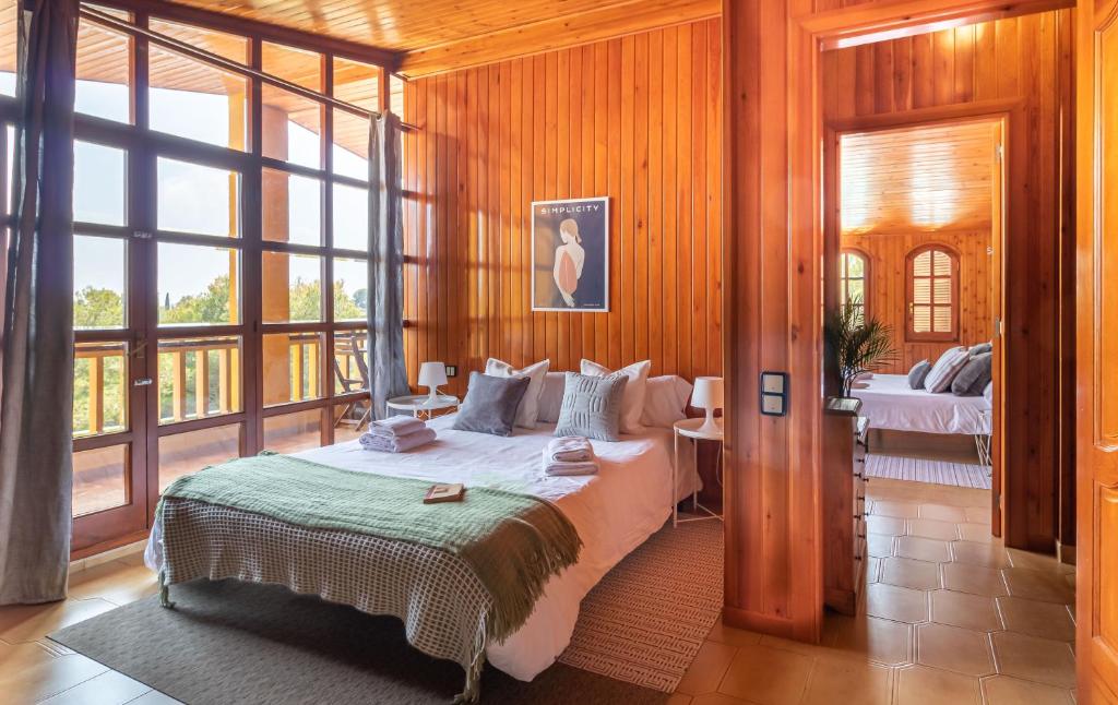 Posteľ alebo postele v izbe v ubytovaní Villa Golf Sitges