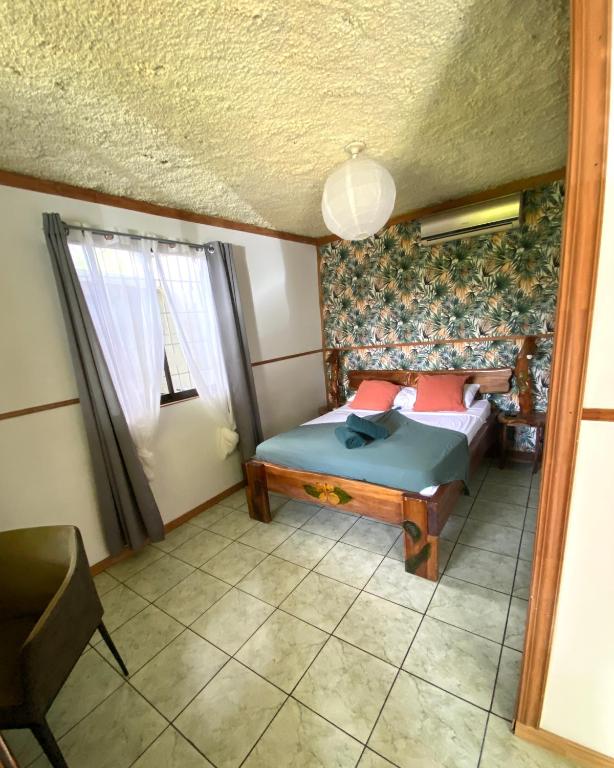 Postel nebo postele na pokoji v ubytování Cabinas Cahuita
