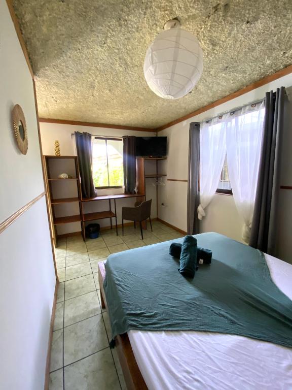 Postel nebo postele na pokoji v ubytování Cabinas Cahuita