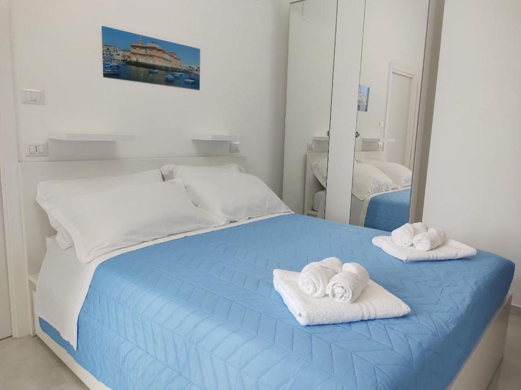 Postel nebo postele na pokoji v ubytování Mare Luna Apartment