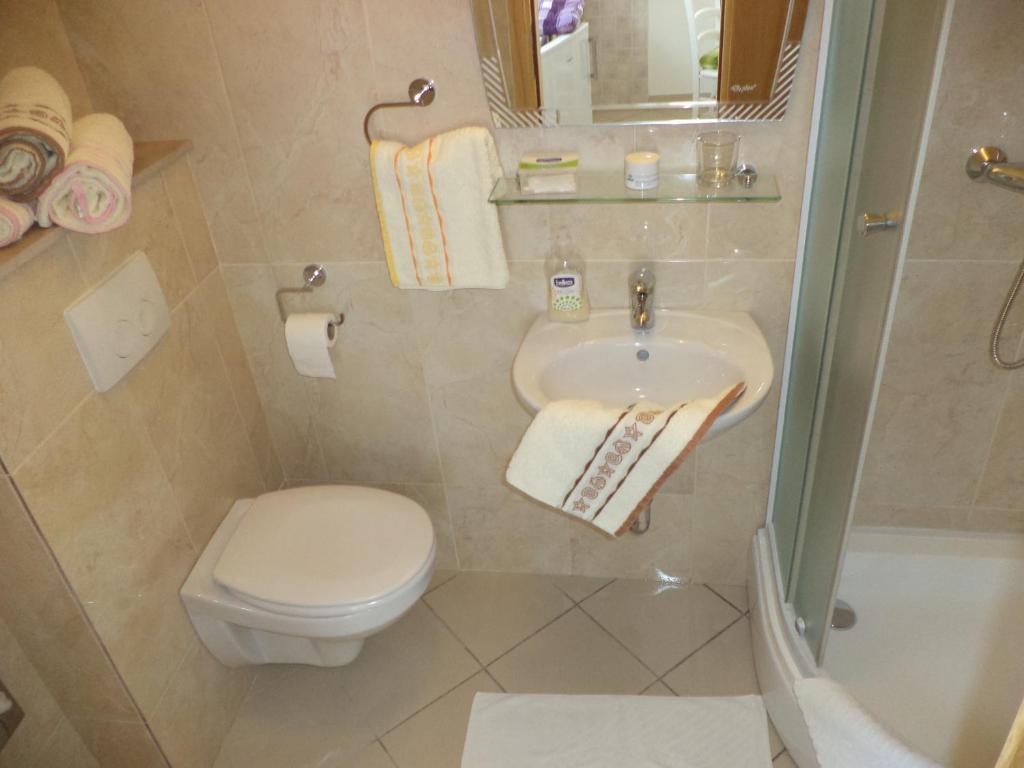 Kúpeľňa v ubytovaní Apartments & Rooms Abba