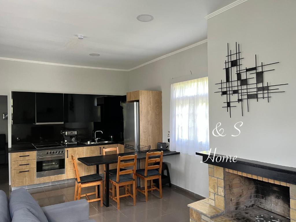 Kuchyňa alebo kuchynka v ubytovaní S&S Home