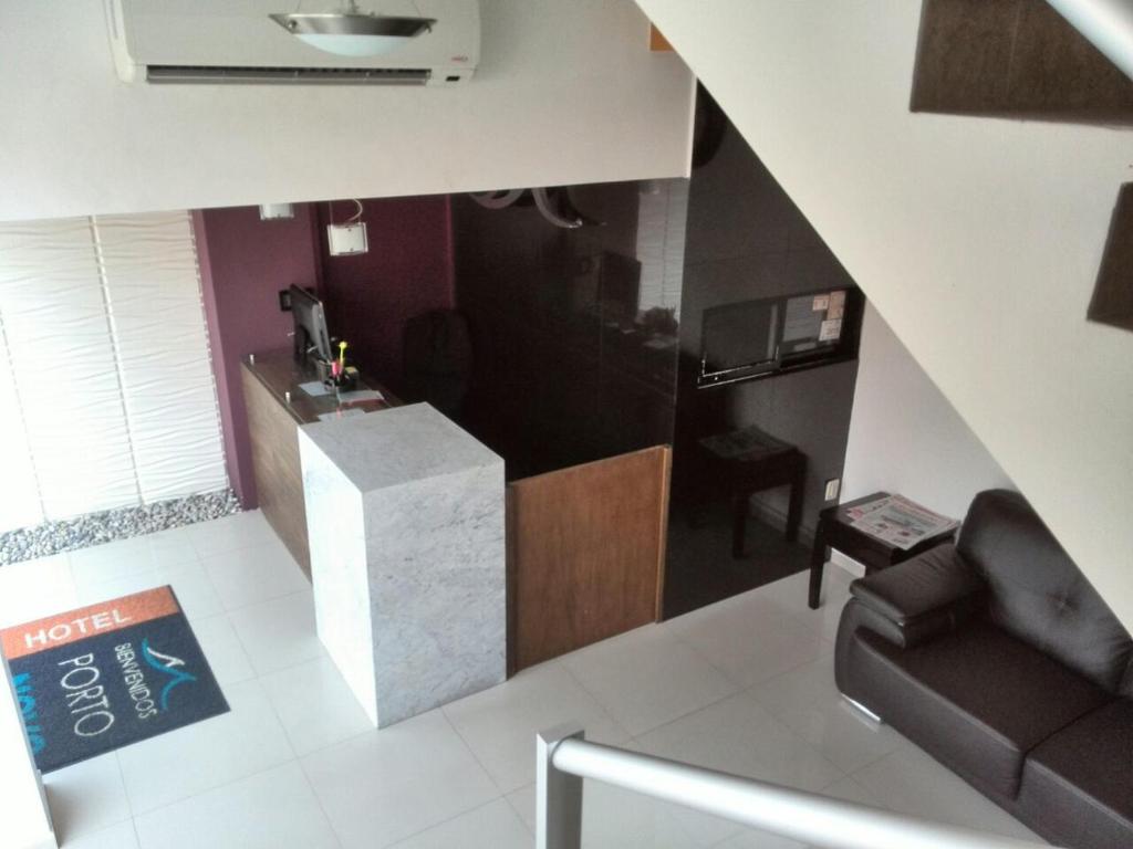 Kuchyň nebo kuchyňský kout v ubytování Hotel Porto Novo