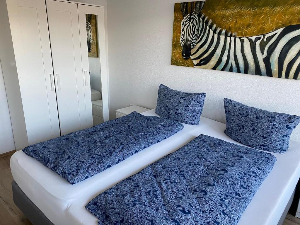 En eller flere senge i et værelse på Apartment-Hohenstein