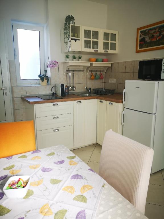 Kuchyň nebo kuchyňský kout v ubytování Apartments Prosperina Hvar