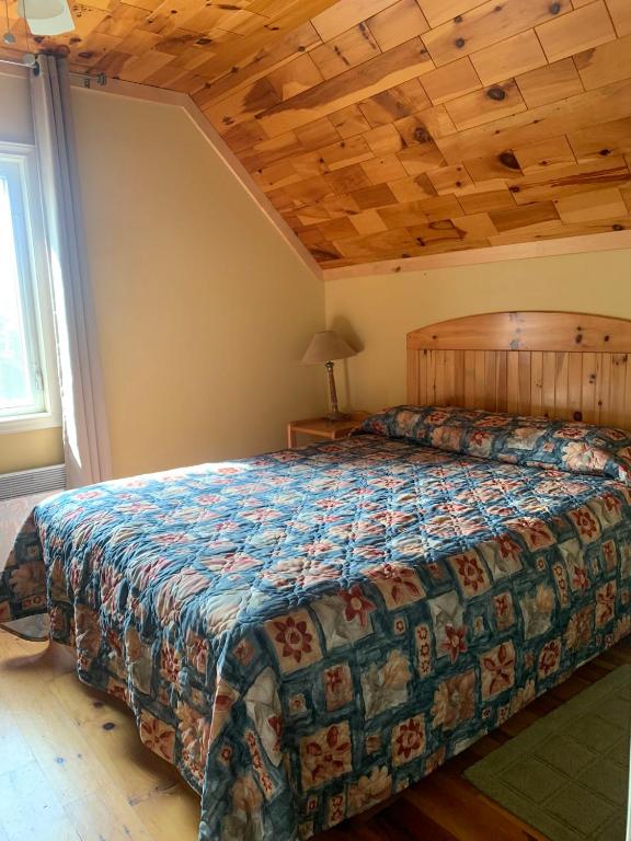 Postel nebo postele na pokoji v ubytování Brudenell Fairway Chalets