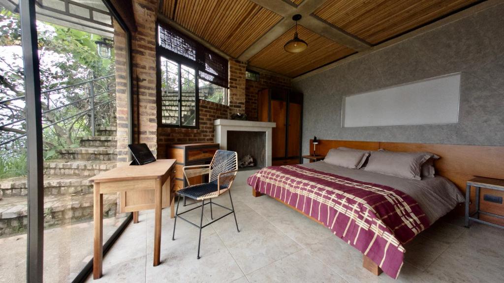 Postel nebo postele na pokoji v ubytování Suite en las Nubes Hotel Portal 360