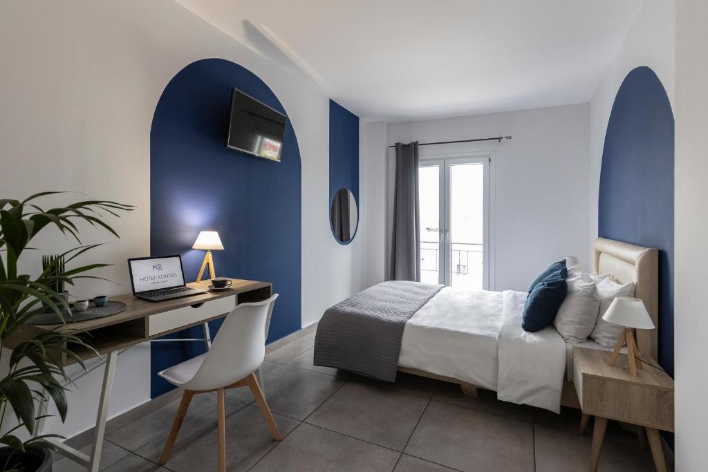 Postel nebo postele na pokoji v ubytování Hotel Kontes Comfort