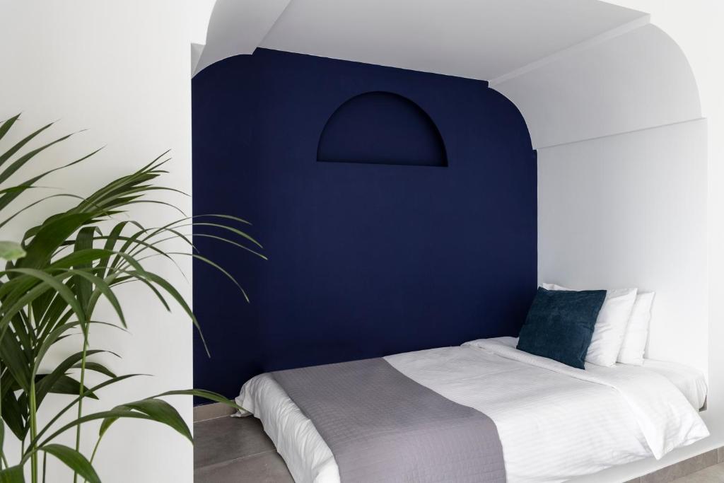 Ein Bett oder Betten in einem Zimmer der Unterkunft Hotel Kontes Comfort