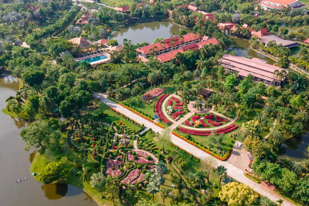 an aerial view of a amusement park next to a river at Horizon Village & Resort SHA Plus in Doi Saket