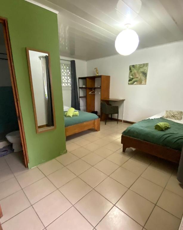 Postel nebo postele na pokoji v ubytování Cabinas Cahuita