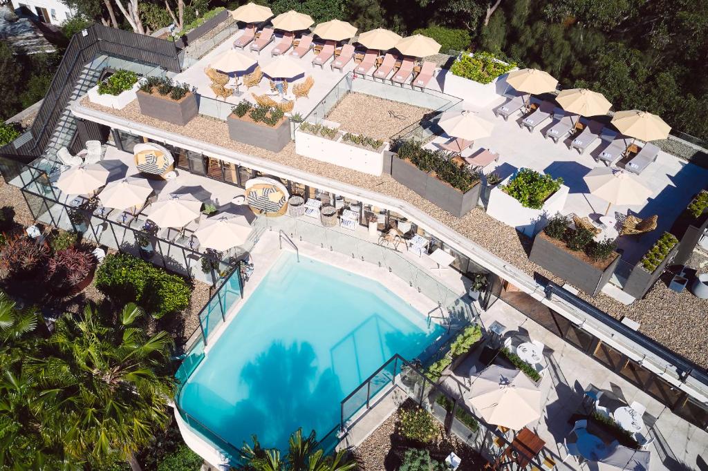 an overhead view of a swimming pool at a resort at Bannisters Pavilion Mollymook in Mollymook