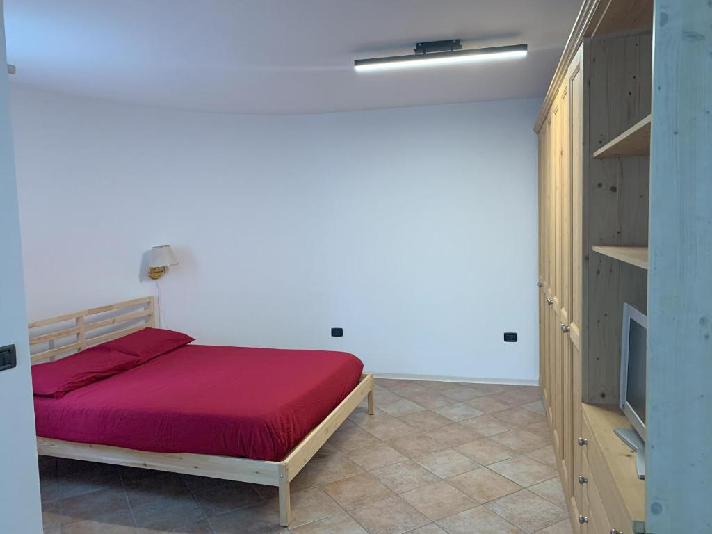 Postel nebo postele na pokoji v ubytování Appartamento La Torre