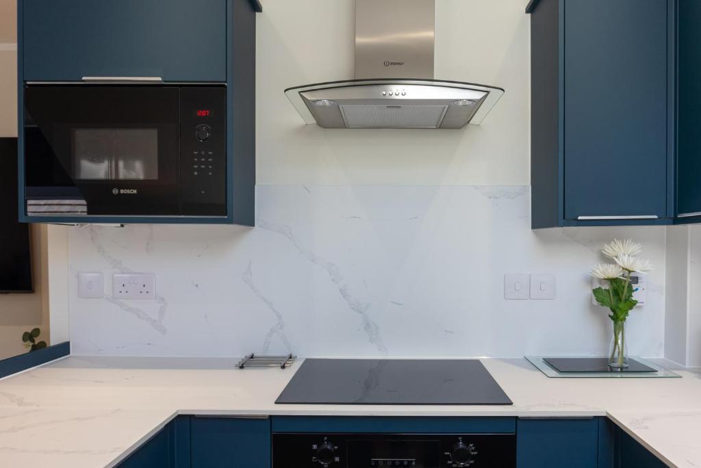 Kuchyň nebo kuchyňský kout v ubytování Combie Lane Apartment