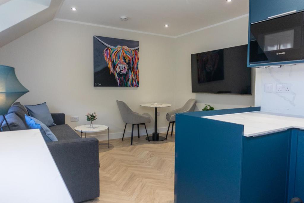 TV a/nebo společenská místnost v ubytování Combie Lane Apartment