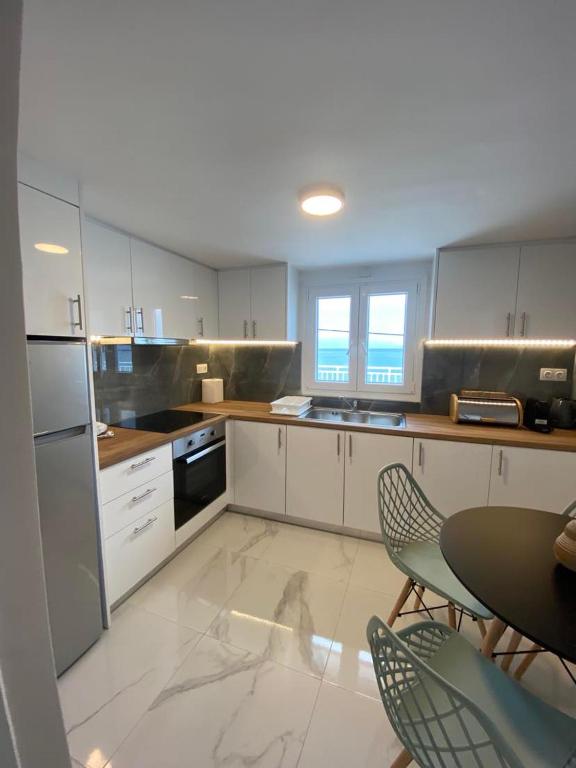 Kuchyň nebo kuchyňský kout v ubytování Casa Costera 3 lux apt