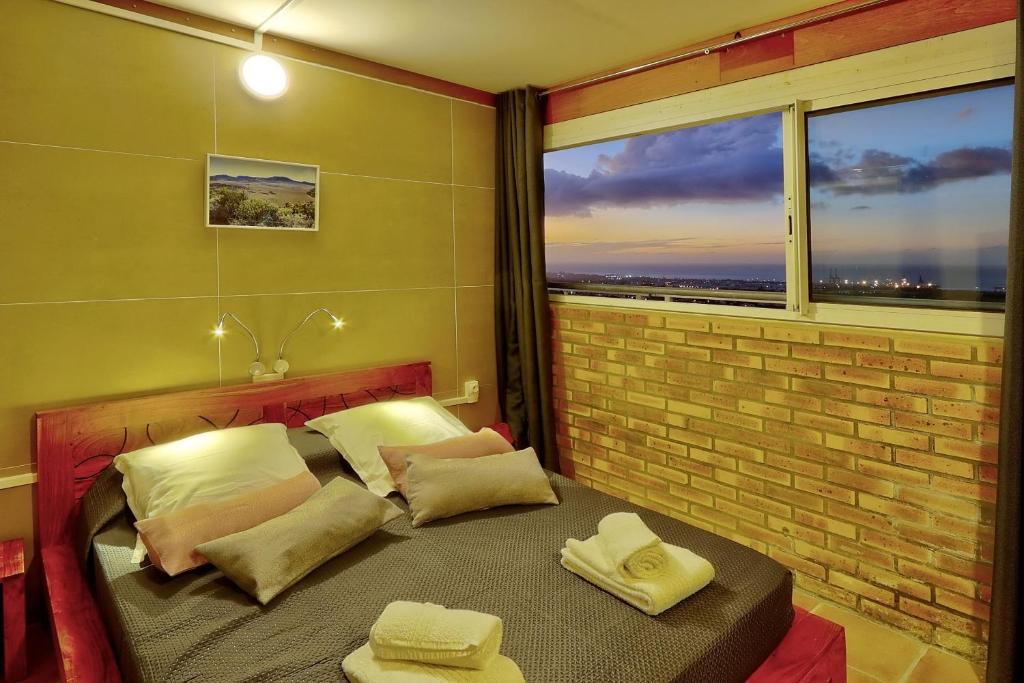 Postel nebo postele na pokoji v ubytování Vaste chambre vue mer montagne Ti Kaz Miyou 3