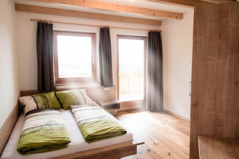 Postel nebo postele na pokoji v ubytování Perchnerhof