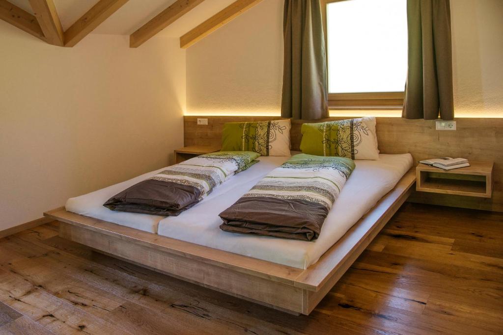 Postel nebo postele na pokoji v ubytování Perchnerhof
