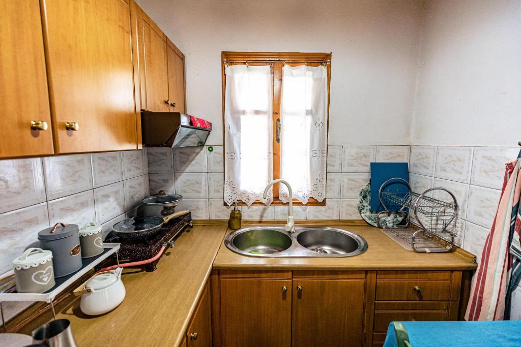 Kuchyň nebo kuchyňský kout v ubytování Halatsogiannis Mansion