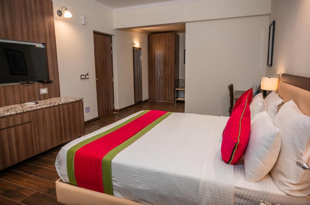 Postel nebo postele na pokoji v ubytování La Oasis by Meraden ,Goa