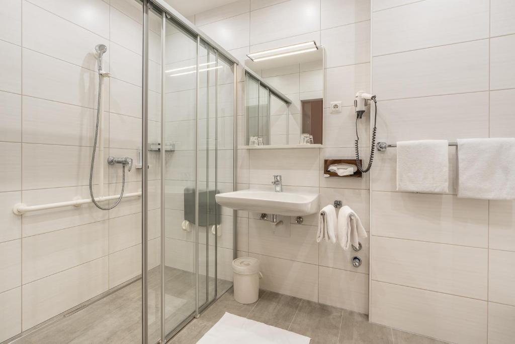 Koupelna v ubytování Hotel Kern Buam