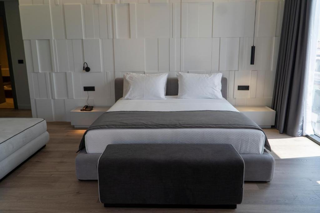 Postel nebo postele na pokoji v ubytování Center Hotel