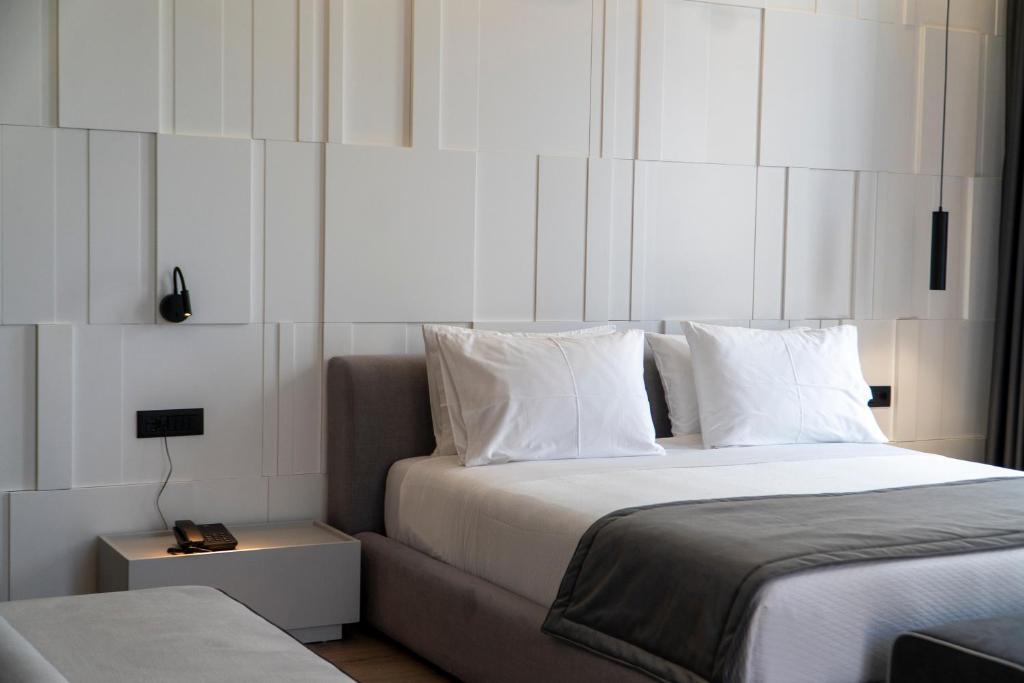 Postel nebo postele na pokoji v ubytování Center Hotel