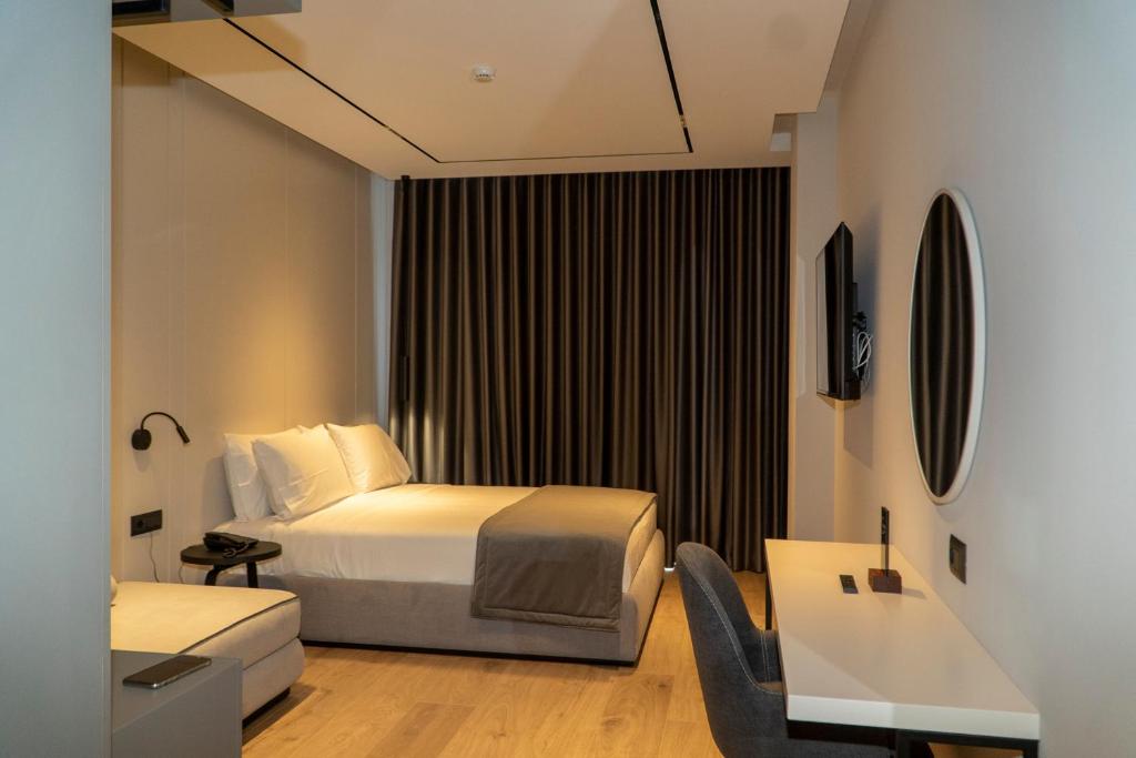 Postel nebo postele na pokoji v ubytování Center Hotel