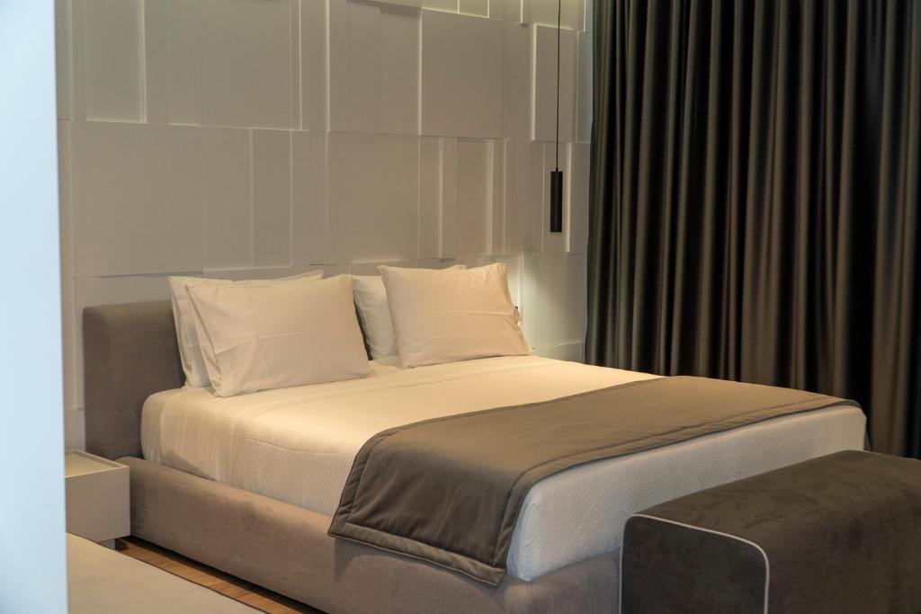 Postel nebo postele na pokoji v ubytování Center Hotel