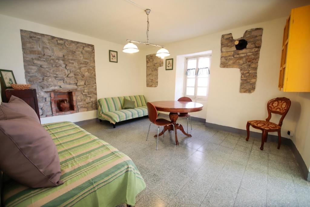 Postel nebo postele na pokoji v ubytování HONEY HOME Ponzone