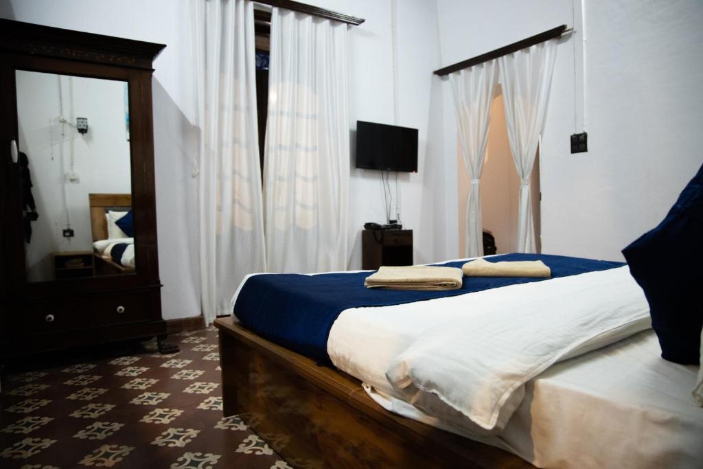 Postel nebo postele na pokoji v ubytování Casa De Silver