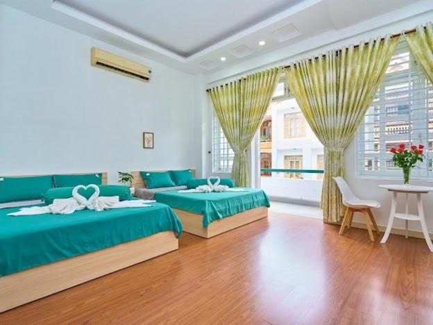 Postel nebo postele na pokoji v ubytování Đặng Diễm My Homestay 12A