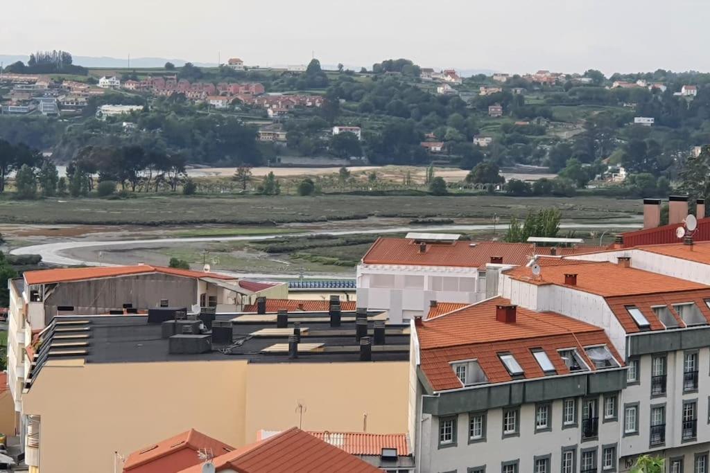 Nespecifikovaný výhled na destinaci Miño nebo výhled na město při pohledu z apartmánu