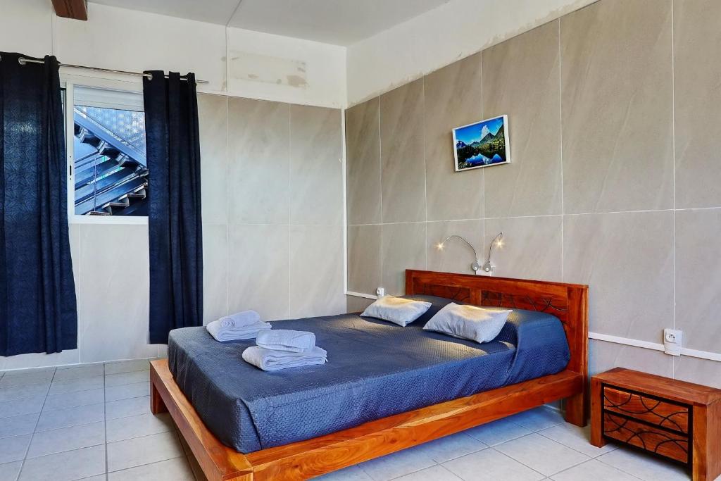 Postel nebo postele na pokoji v ubytování Vaste chambre vue mer montagne Ti Kaz Miyou 3