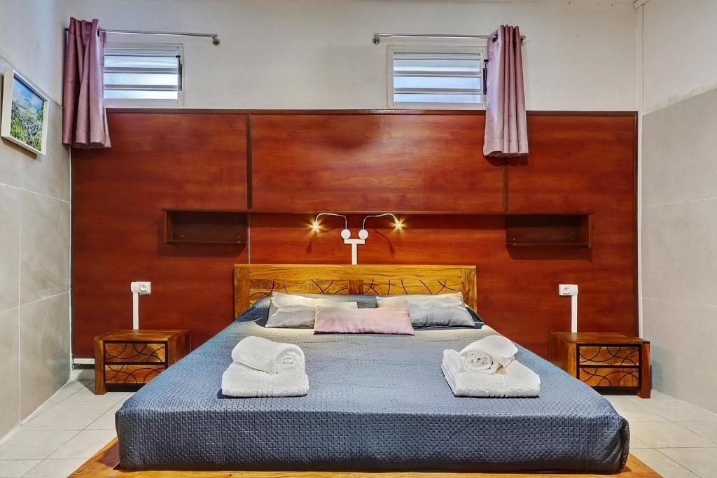 Postel nebo postele na pokoji v ubytování Vaste chambre vue mer montagne Ti Kaz Miyou 3