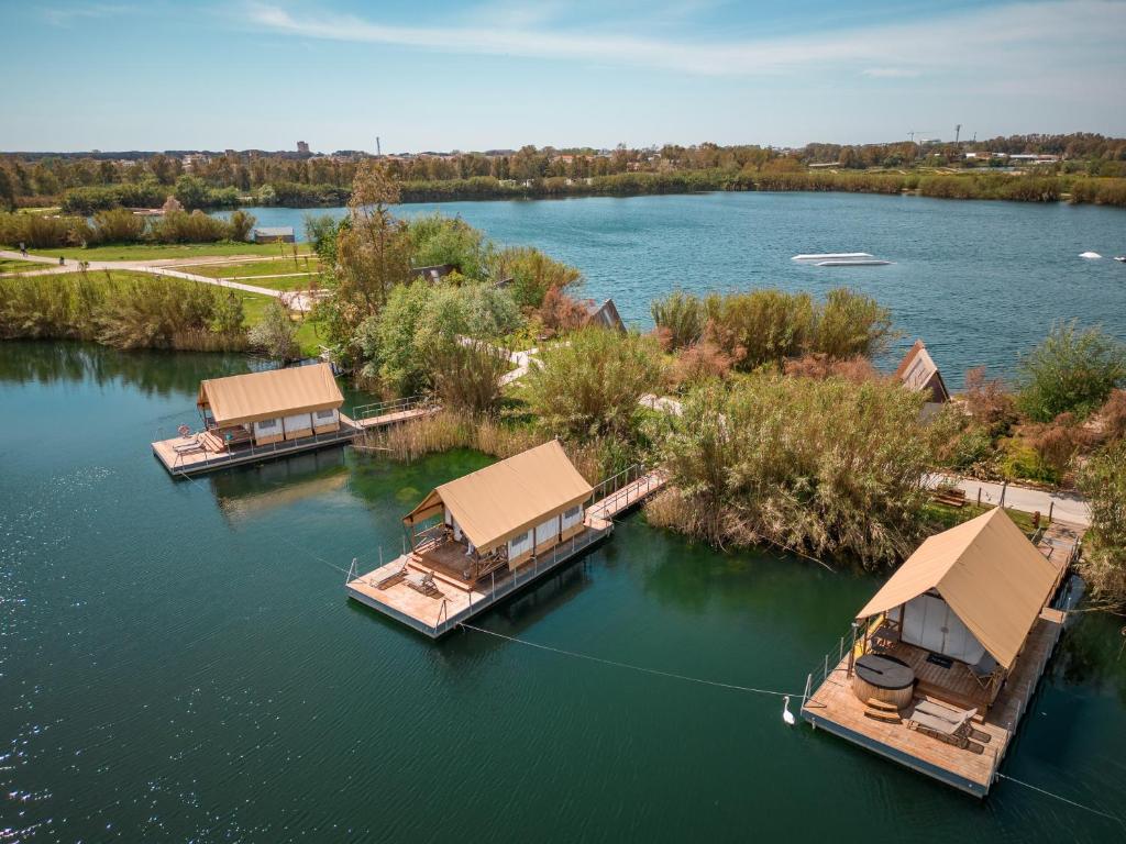 an aerial view of two boats on a lake at Nabi Resort Glamping & SPA in Castel Volturno