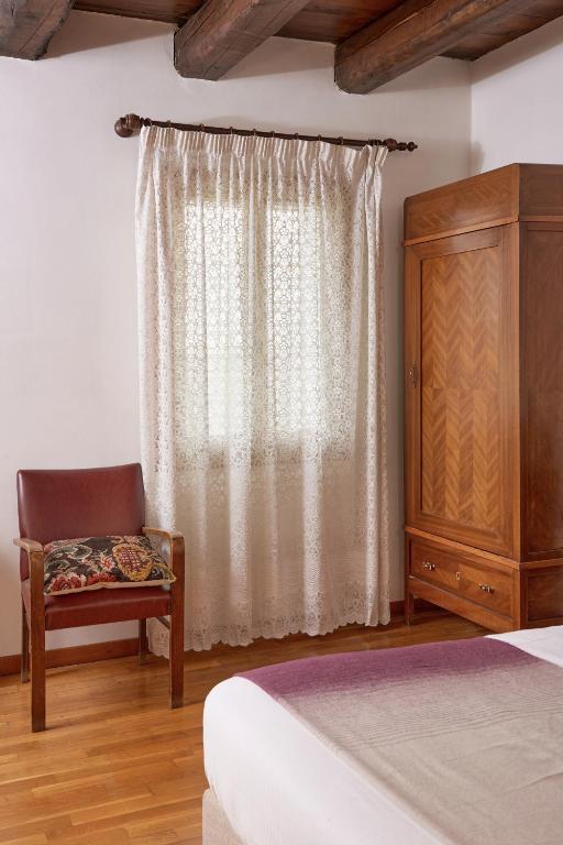 Postel nebo postele na pokoji v ubytování Agriturismo Rechsteiner