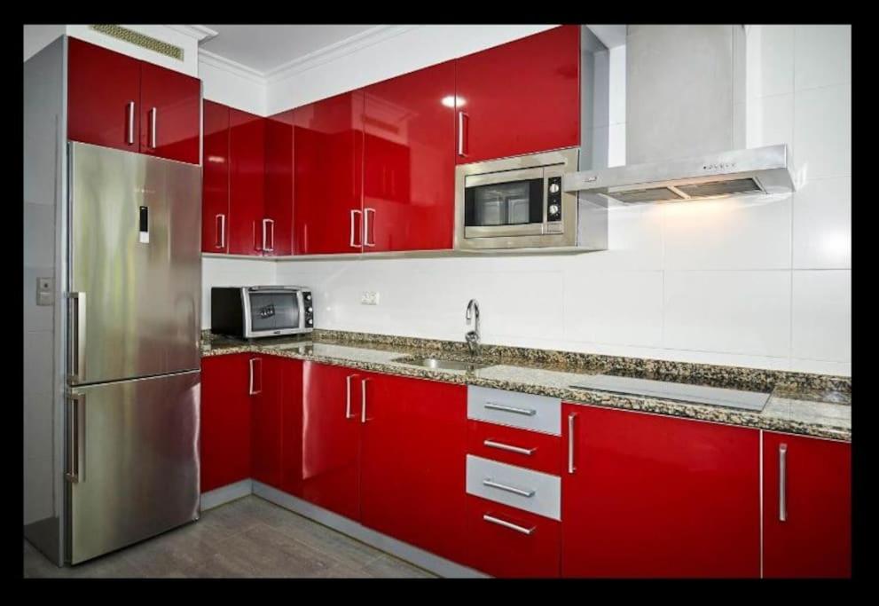 Kuchyňa alebo kuchynka v ubytovaní Acogedor y precioso apartamento + parking privado
