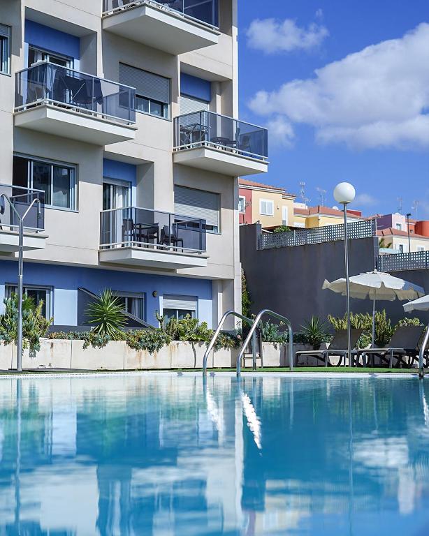 Piscine de l'établissement Cornisa Apartments ou située à proximité