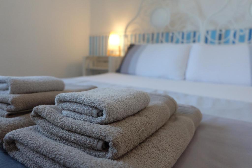 Postel nebo postele na pokoji v ubytování B&B CasaNera