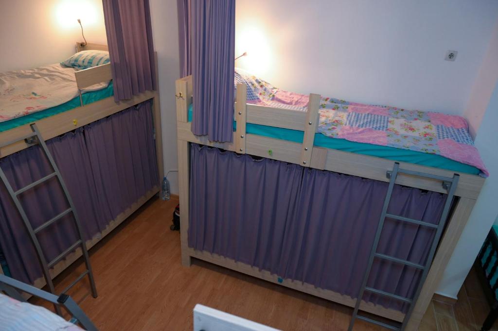 Postel nebo postele na pokoji v ubytování Skopje Hostel