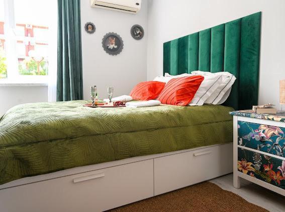 A bed or beds in a room at Nessebar Fort Club - Prestige Apartments