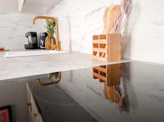 A kitchen or kitchenette at Nessebar Fort Club - Prestige Apartments