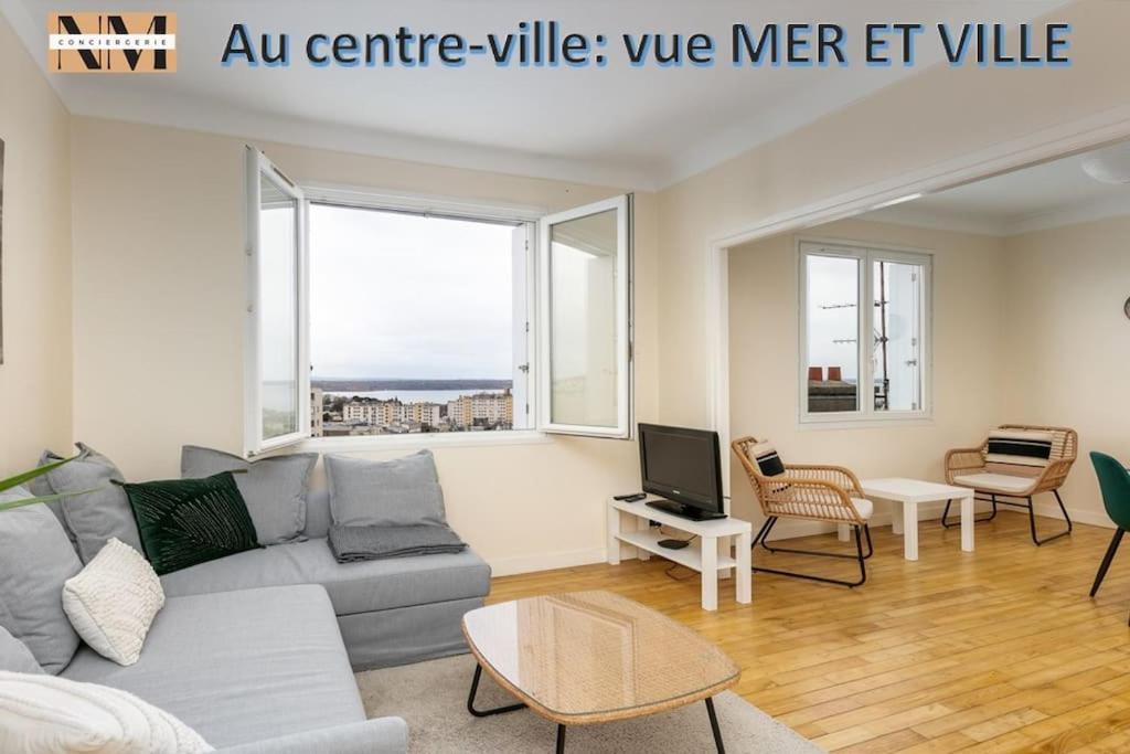 a living room with a couch and chairs and windows at Vue mer &#47; Jaurès-Centre-Ville &#47; Appart Lumineux in Brest